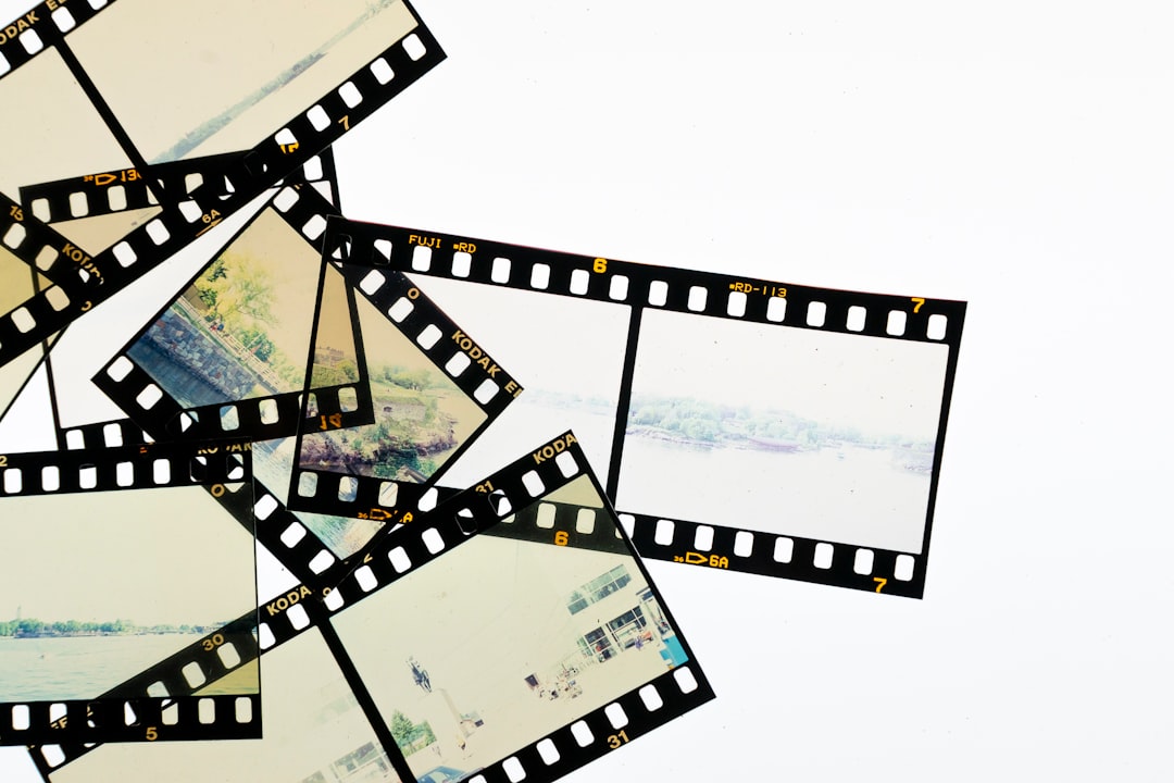 A pile of film strips with pictures on them